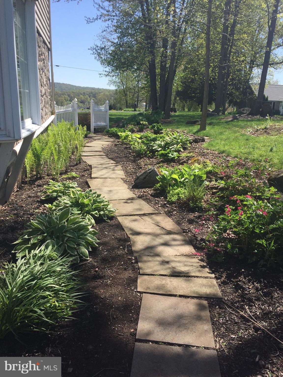 135 Martzall Road Denver, PA 17517 - Photo 26 of 26 Perennial gardens, nice out door landscaping.