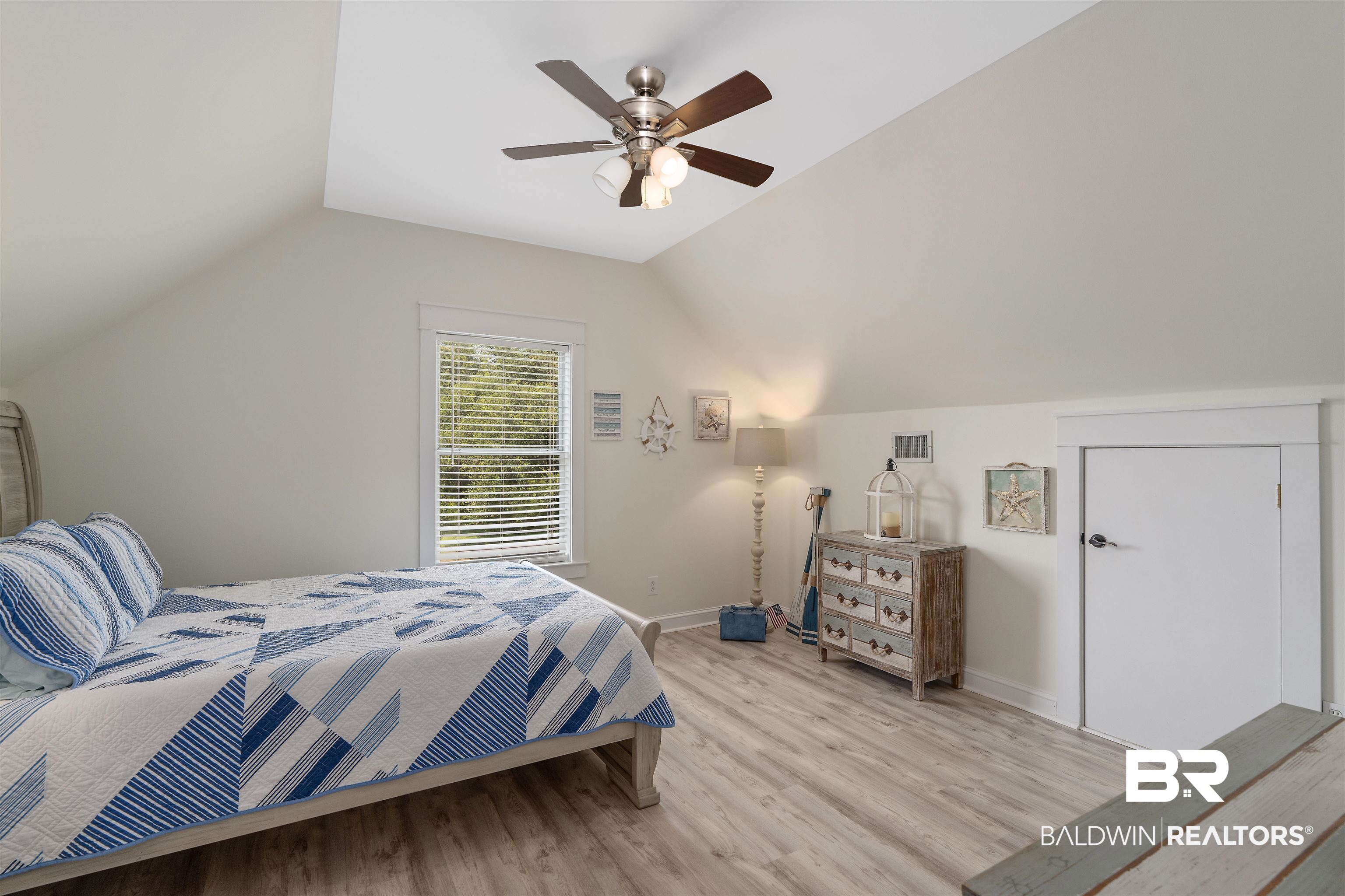 16330 Danne Road Fairhope, AL 36532 - Photo 25 of 43 Bedroom featuring ceiling fan, light wood-type flooring, and vaulted ceiling