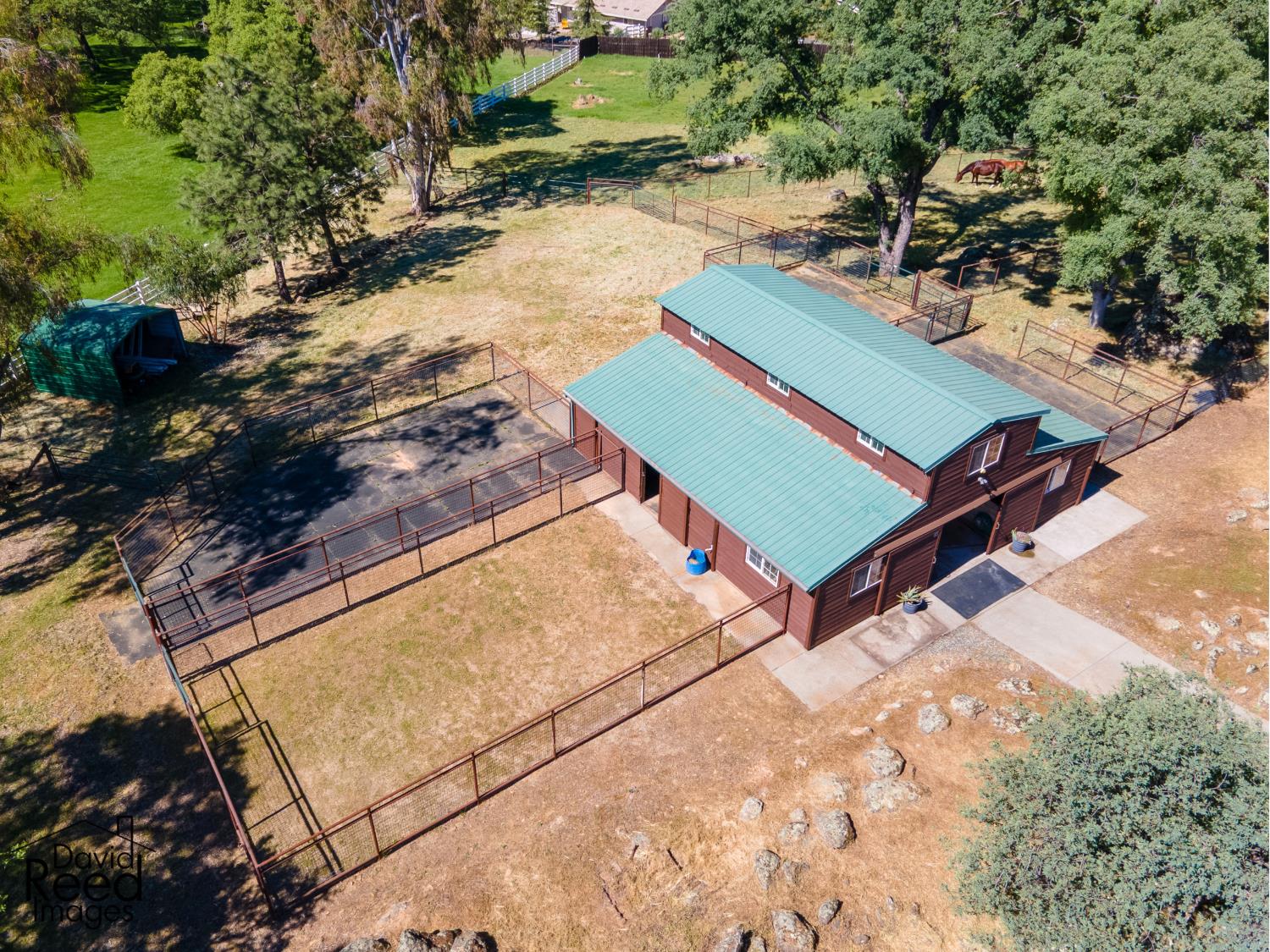 5560 Ralston Way Placerville, CA 95667 - Photo 68 of 78 Barn with Paddocks and access to multiple fenced enclosures and useable pastures.