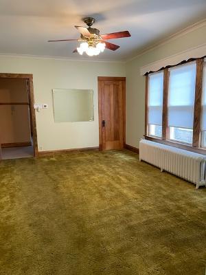 6130 West Patterson Avenue Chicago, IL 60634 - Photo 3 of 16 a view of an empty room with a window