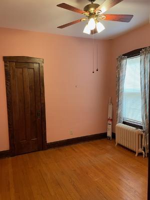 6130 West Patterson Avenue Chicago, IL 60634 - Photo 5 of 16 an empty room with windows and closet
