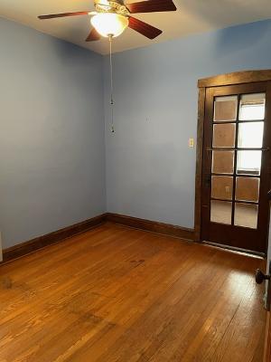 6130 West Patterson Avenue Chicago, IL 60634 - Photo 6 of 16 an empty room with a window