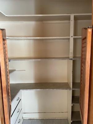 6130 West Patterson Avenue Chicago, IL 60634 - Photo 9 of 16 a view of walk in closet with empty racks