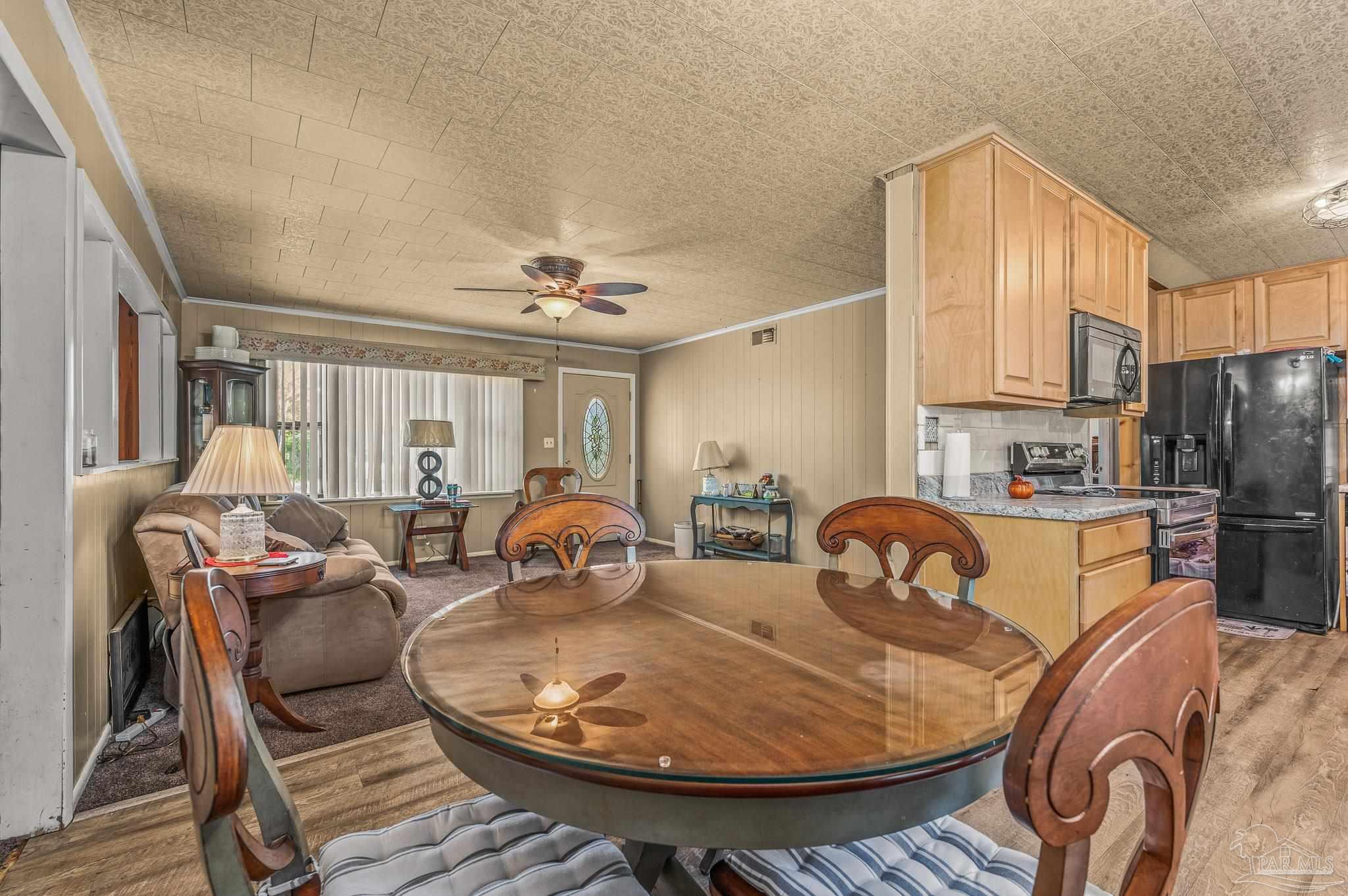 3015 Molino Road Molino, FL 32577 - Photo 35 of 35 a view of a dining room with furniture