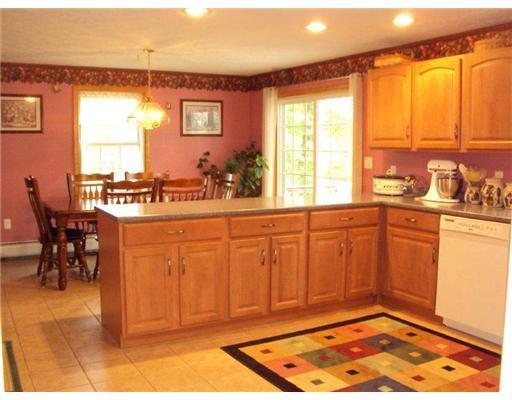 306 Country Club Road Oakland, ME 04963 - Photo 11 of 24 Kitchen. Looking over to the dining...