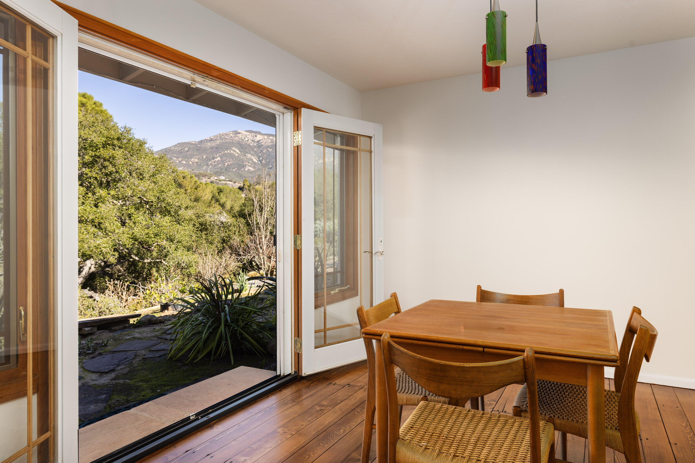 1005 Winther Way Santa Barbara, CA 93110 - Photo 11 of 33 a view of a dining room with furniture and wooden floor