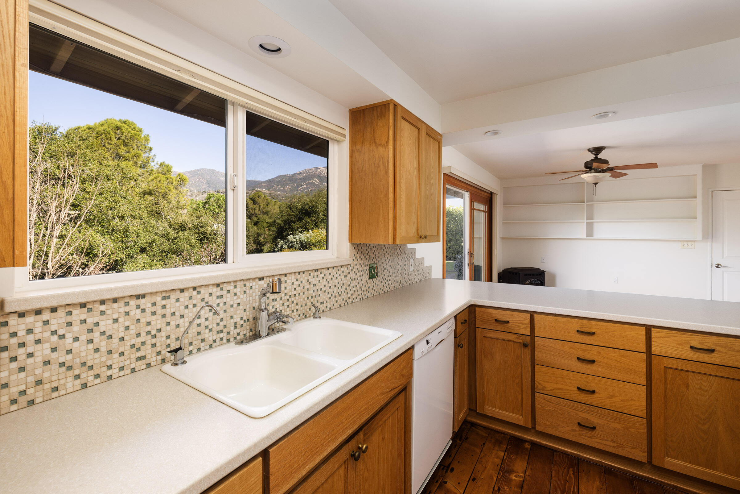 1005 Winther Way Santa Barbara, CA 93110 - Photo 13 of 33 a kitchen with a sink and large window