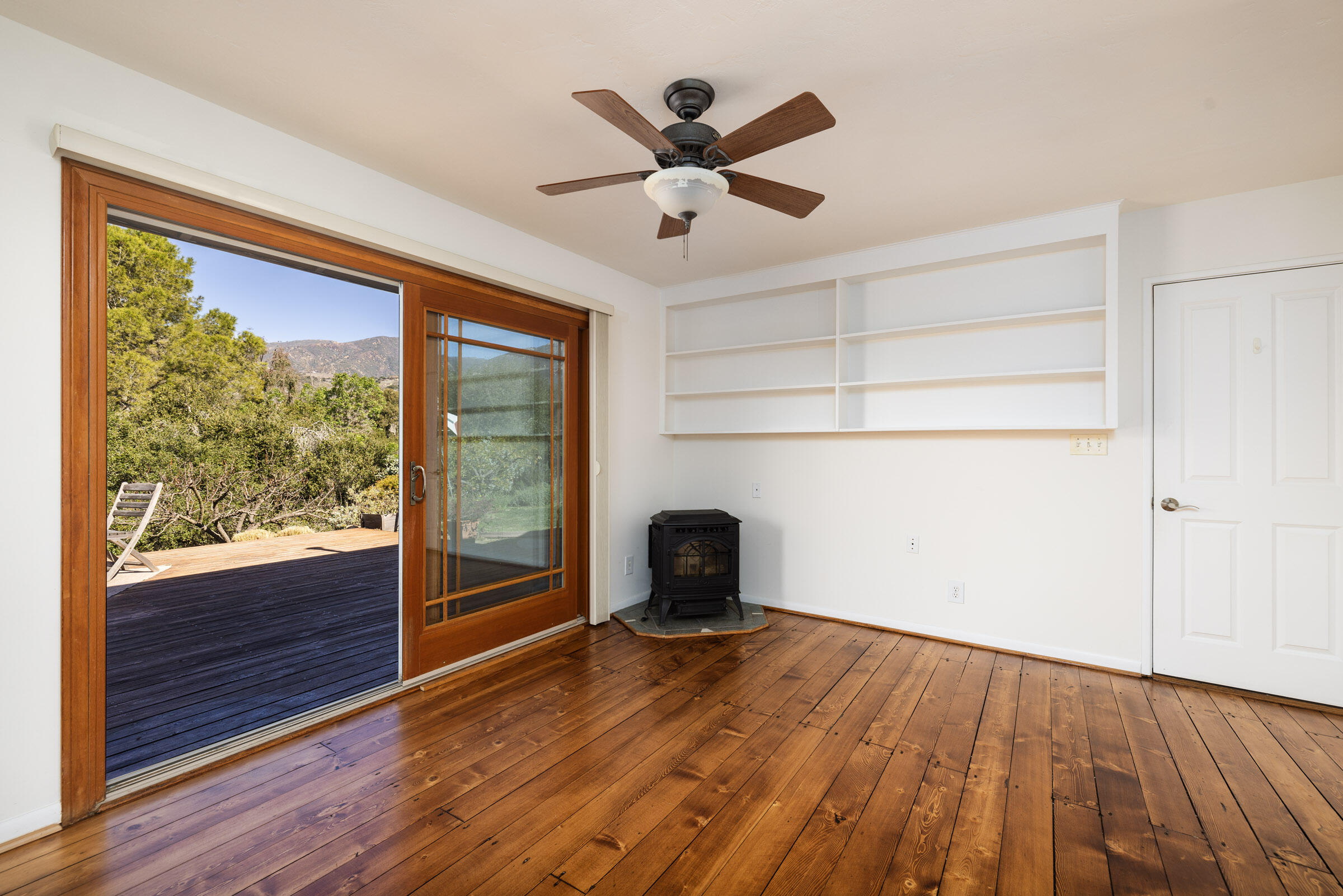 1005 Winther Way Santa Barbara, CA 93110 - Photo 14 of 33 wooden floor in an empty room with a window
