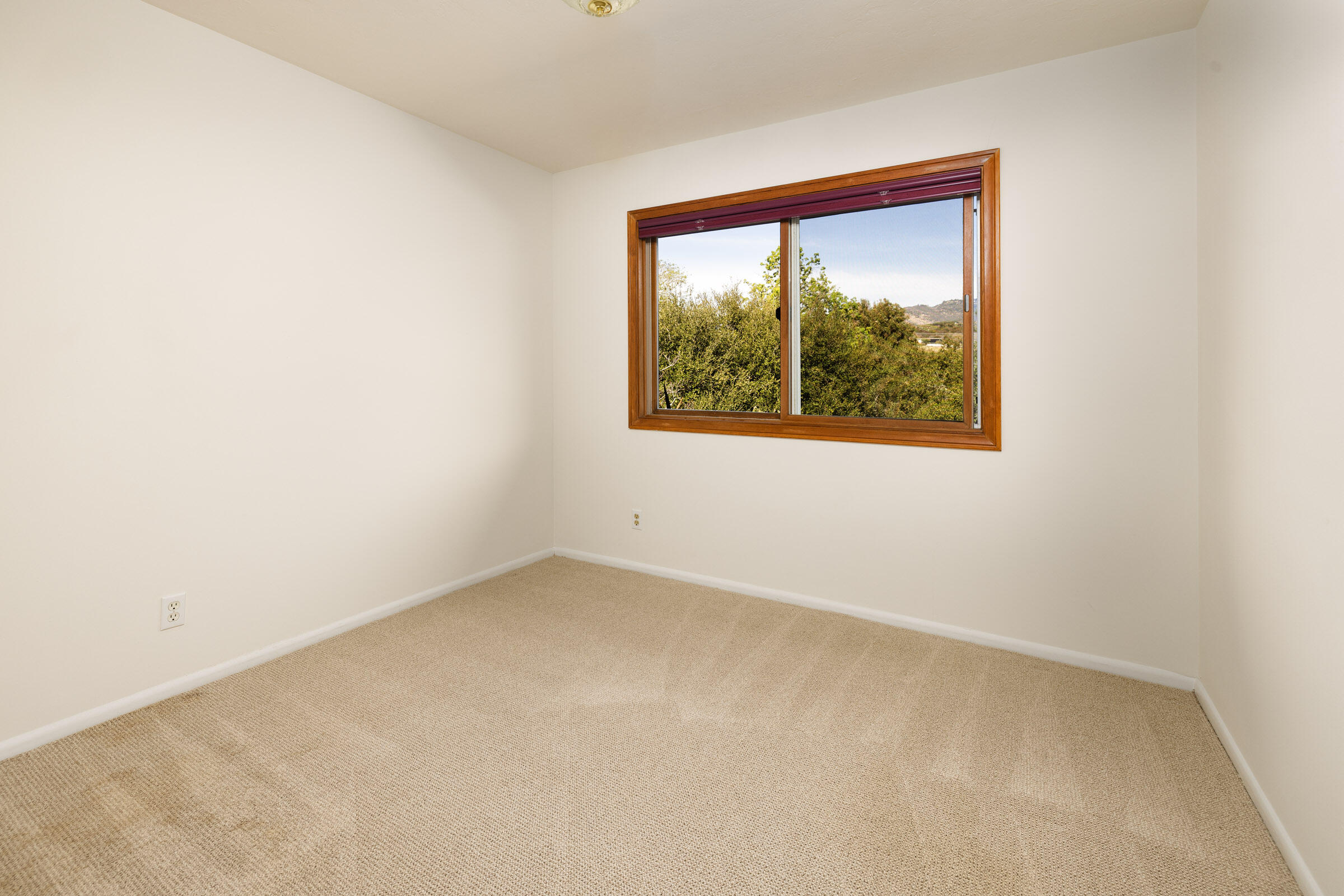 1005 Winther Way Santa Barbara, CA 93110 - Photo 20 of 33 an empty room with a window
