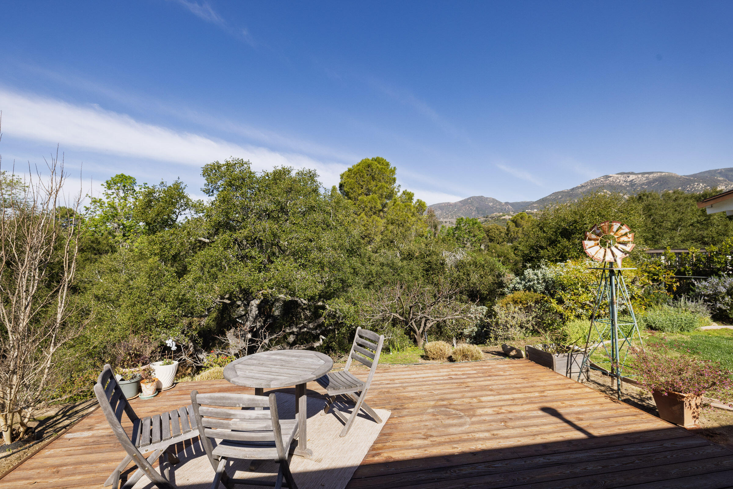 1005 Winther Way Santa Barbara, CA 93110 - Photo 22 of 33 a view of a balcony with chair and wooden floor