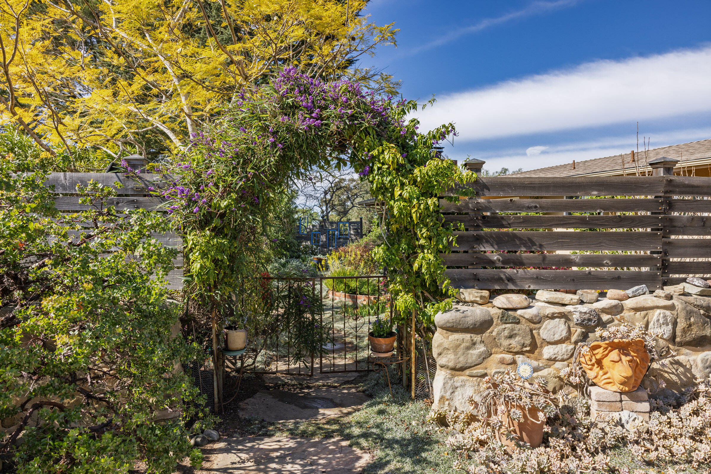 1005 Winther Way Santa Barbara, CA 93110 - Photo 4 of 33 a view of a pathway with a tree