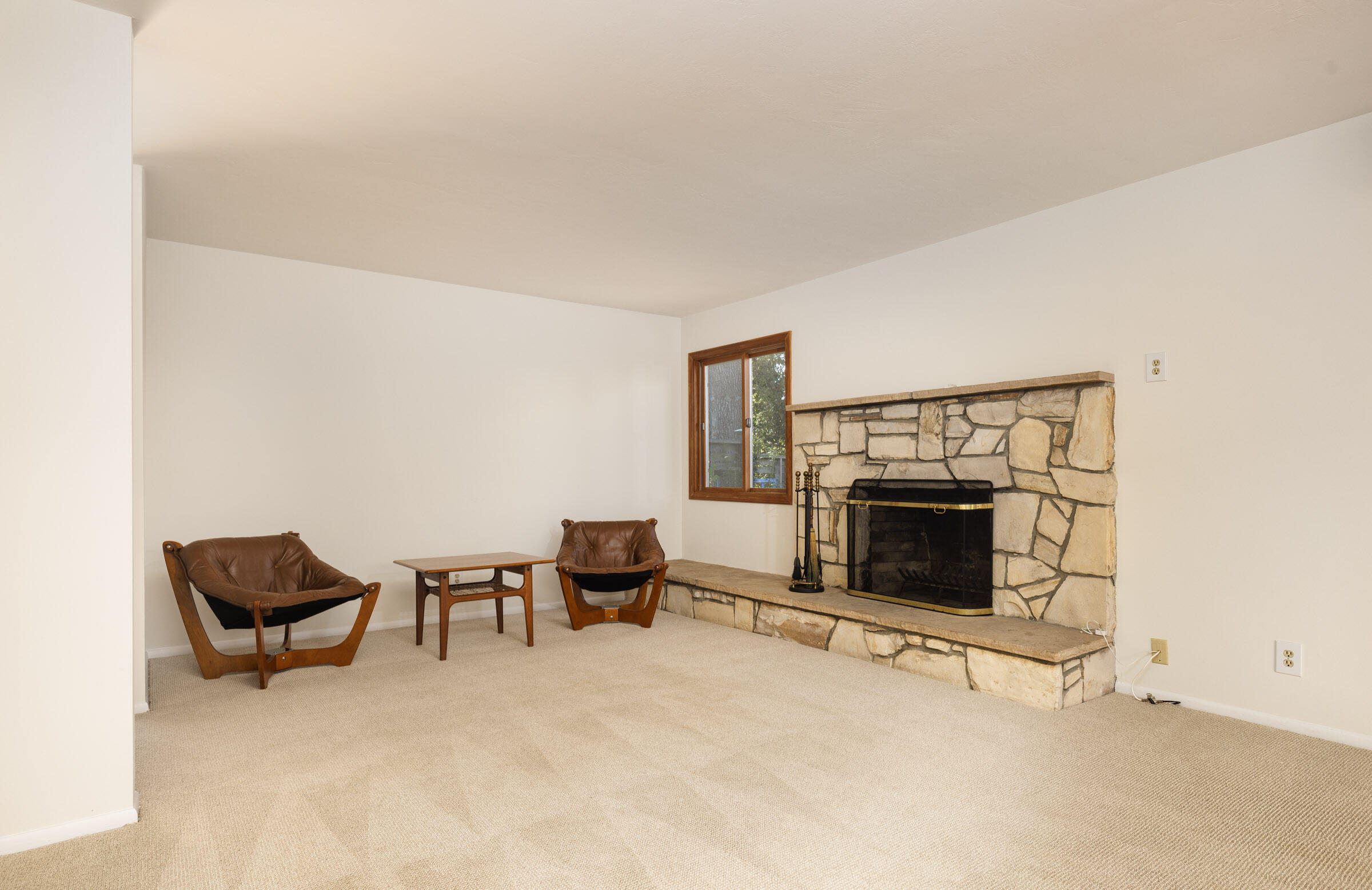 1005 Winther Way Santa Barbara, CA 93110 - Photo 7 of 33 a living room with furniture and a fireplace
