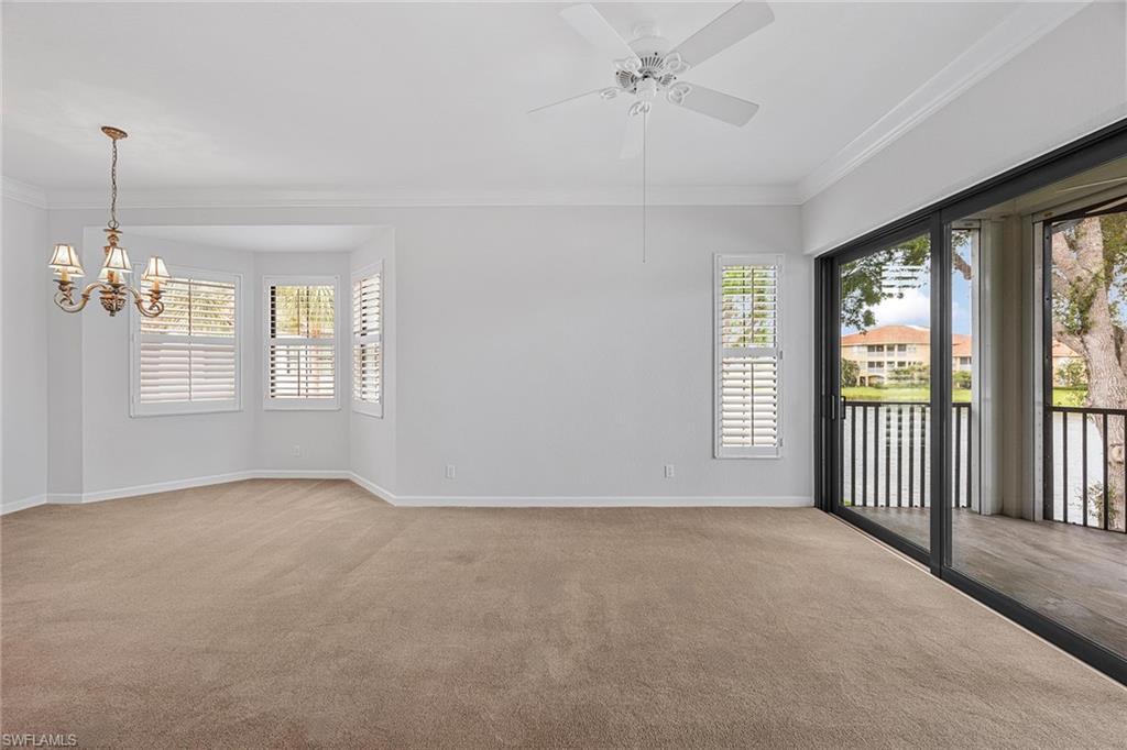 2432 Ravenna Boulevard, Unit 201 Naples, FL 34109 - Photo 22 of 50 a view of an empty room with a window