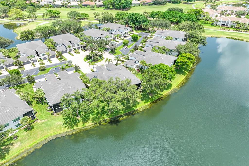 2432 Ravenna Boulevard, Unit 201 Naples, FL 34109 - Photo 37 of 49 an aerial view of residential houses with outdoor space and river