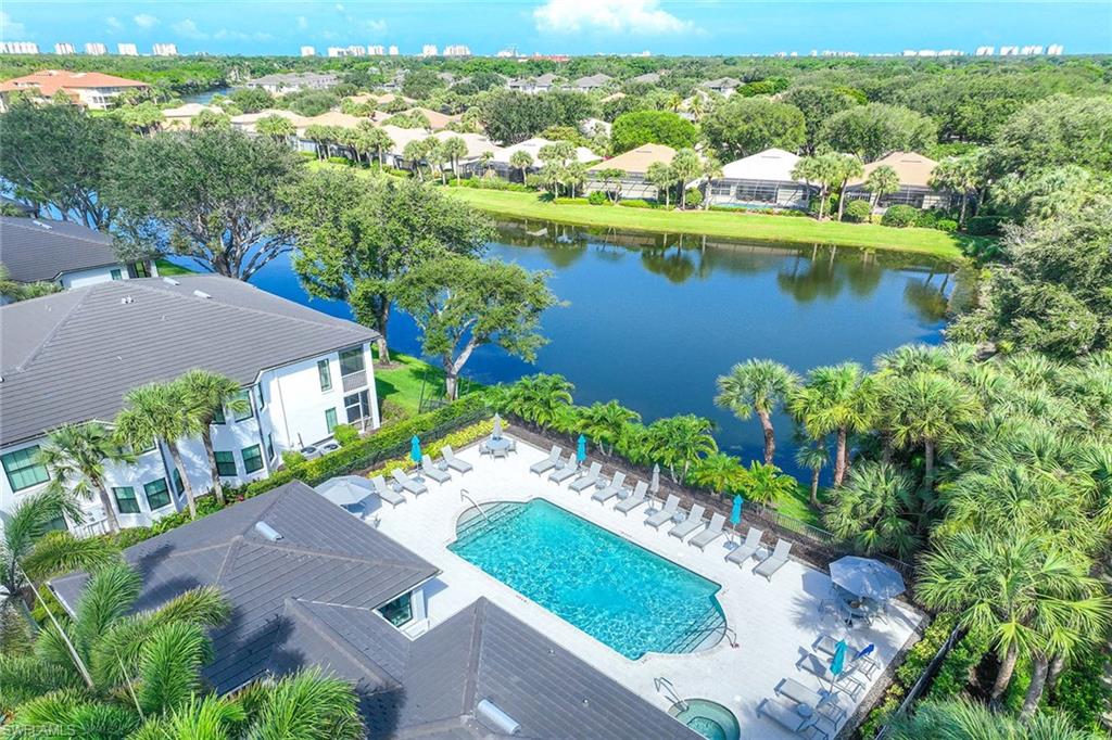 2432 Ravenna Boulevard, Unit 201 Naples, FL 34109 - Photo 40 of 50 an aerial view of a house with a lake view