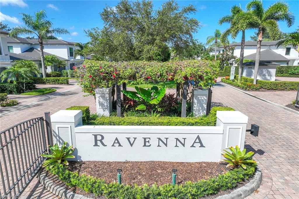 2432 Ravenna Boulevard, Unit 201 Naples, FL 34109 - Photo 43 of 49 a sign that is on the side of the road