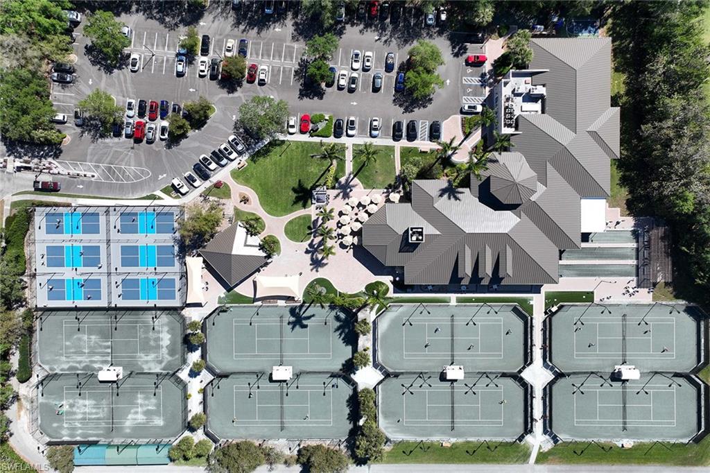 2432 Ravenna Boulevard, Unit 201 Naples, FL 34109 - Photo 45 of 49 an aerial view of a house with yard