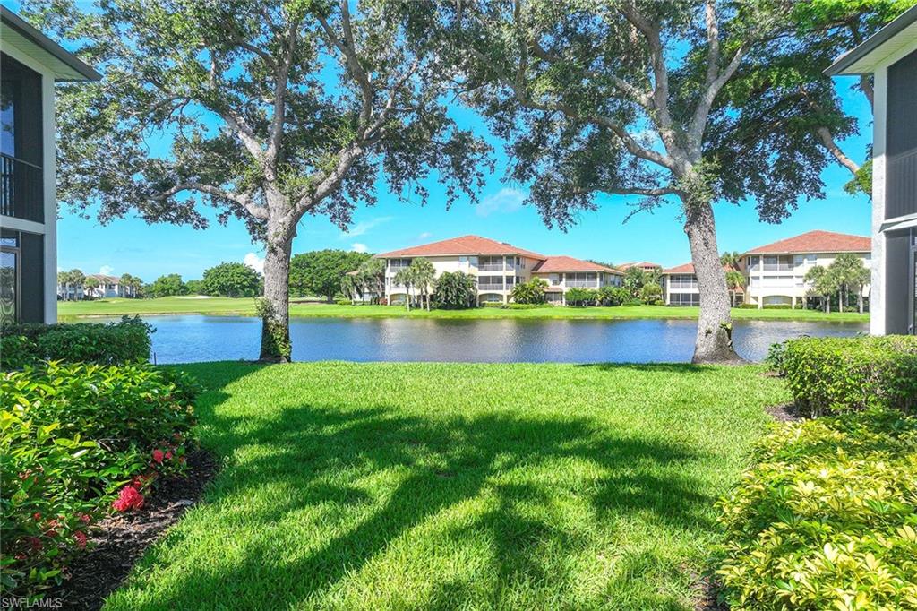 2432 Ravenna Boulevard, Unit 201 Naples, FL 34109 - Photo 7 of 50 a view of a garden with a lake view