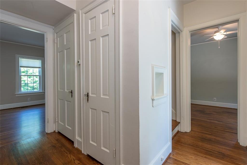 208 Shadowmoor Drive, Unit 208 Decatur, GA 30030 - Photo 11 of 29 a view of a hallway with wooden floor