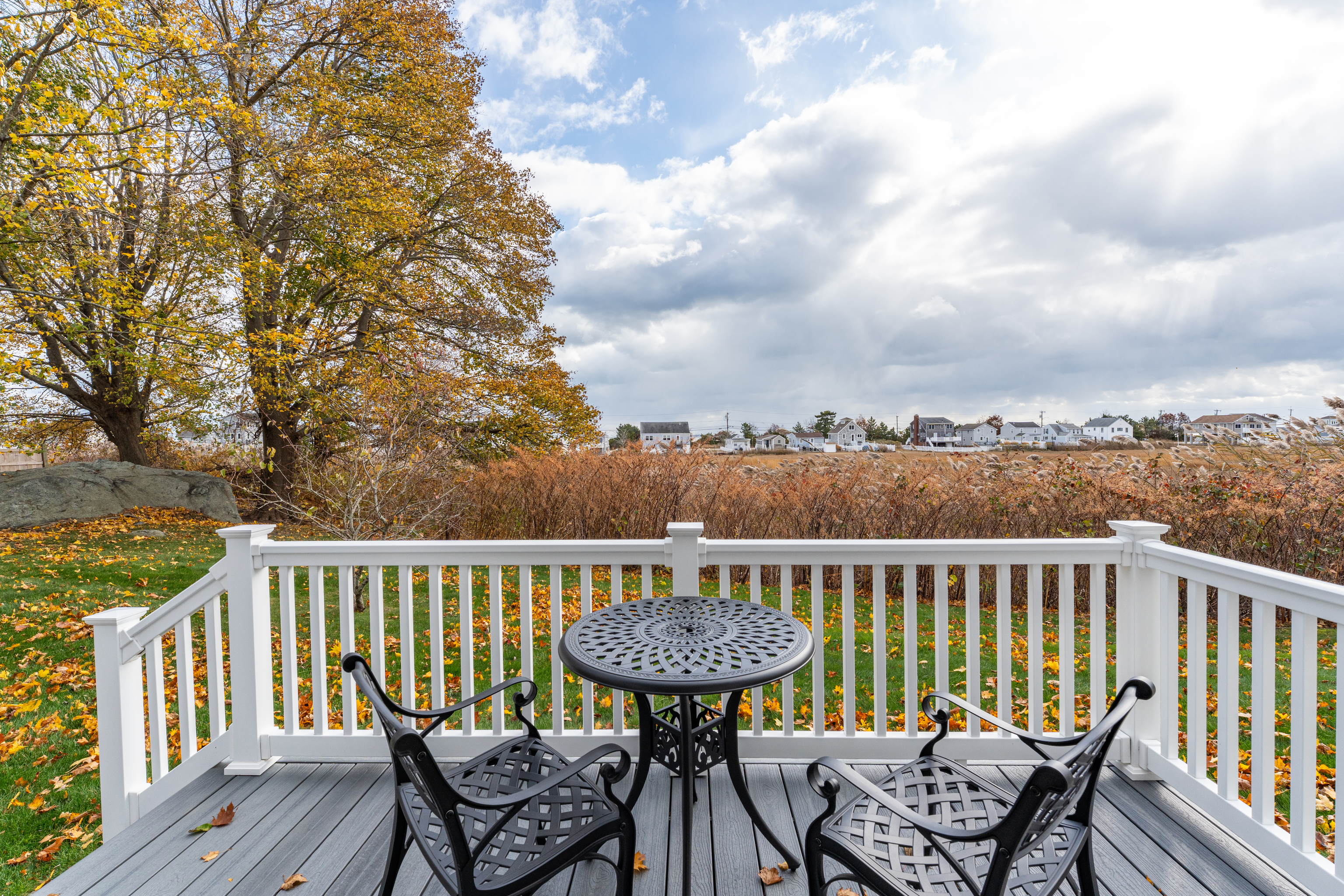 610 Marina Way Landing, Unit 610 Westbrook, CT 06498 - Photo 12 of 40 a view of a chairs and table on the deck