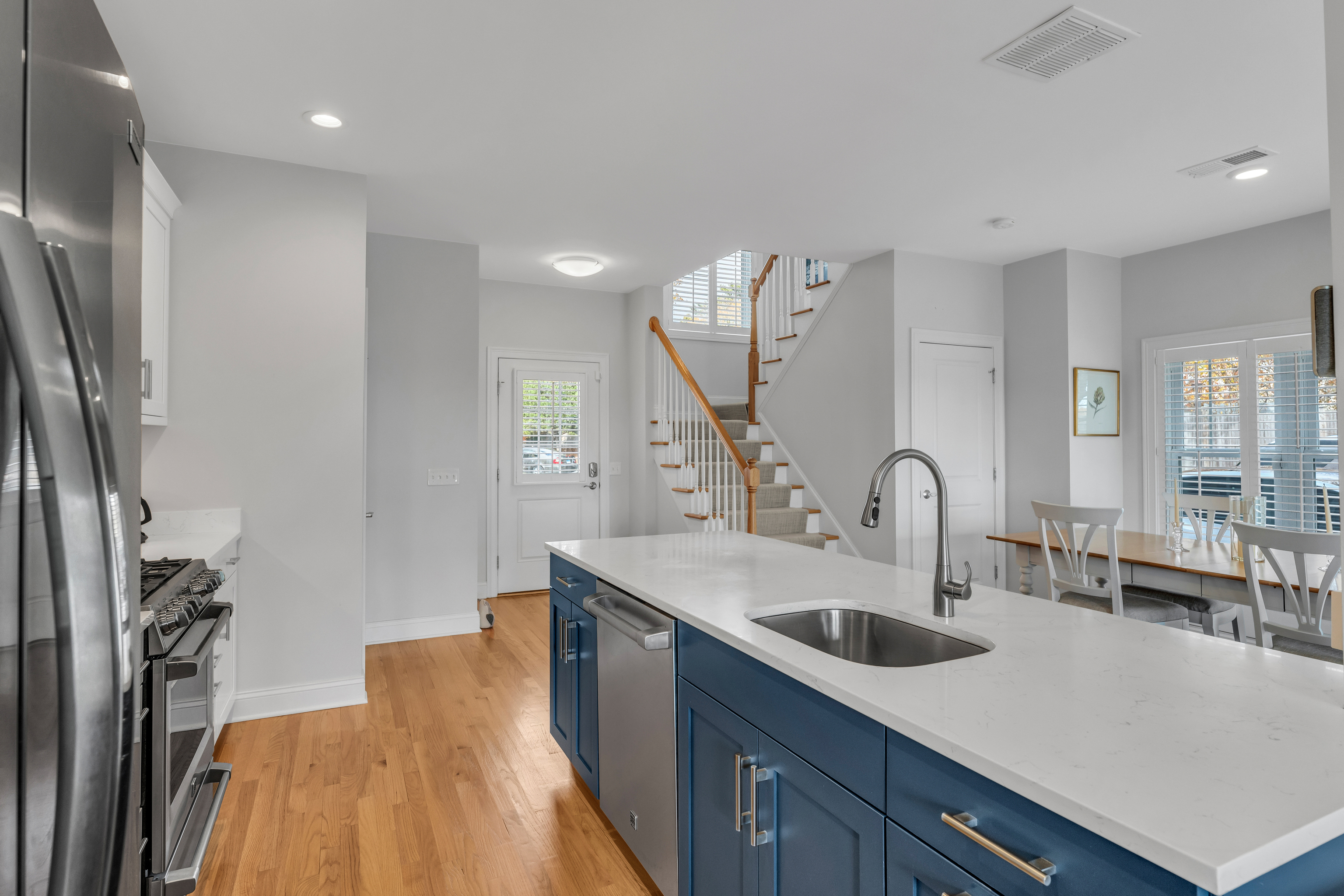 610 Marina Way Landing, Unit 610 Westbrook, CT 06498 - Photo 17 of 40 a kitchen with kitchen island a sink appliances and a counter top space