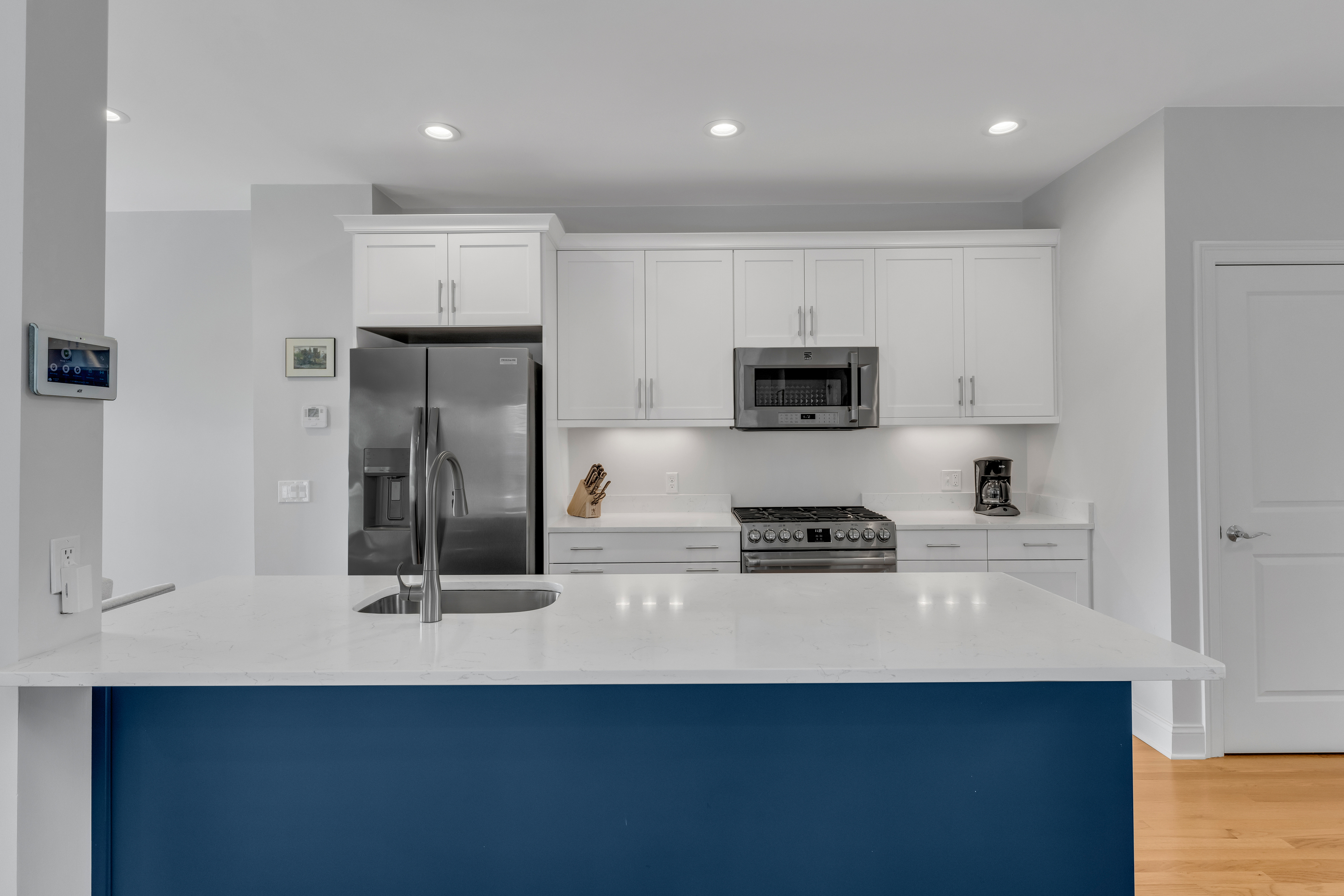 610 Marina Way Landing, Unit 610 Westbrook, CT 06498 - Photo 18 of 40 a kitchen with stainless steel appliances a sink stove and refrigerator