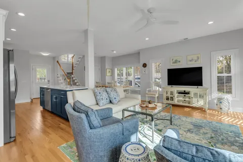 a kitchen with stainless steel appliances a sink stove and refrigerator