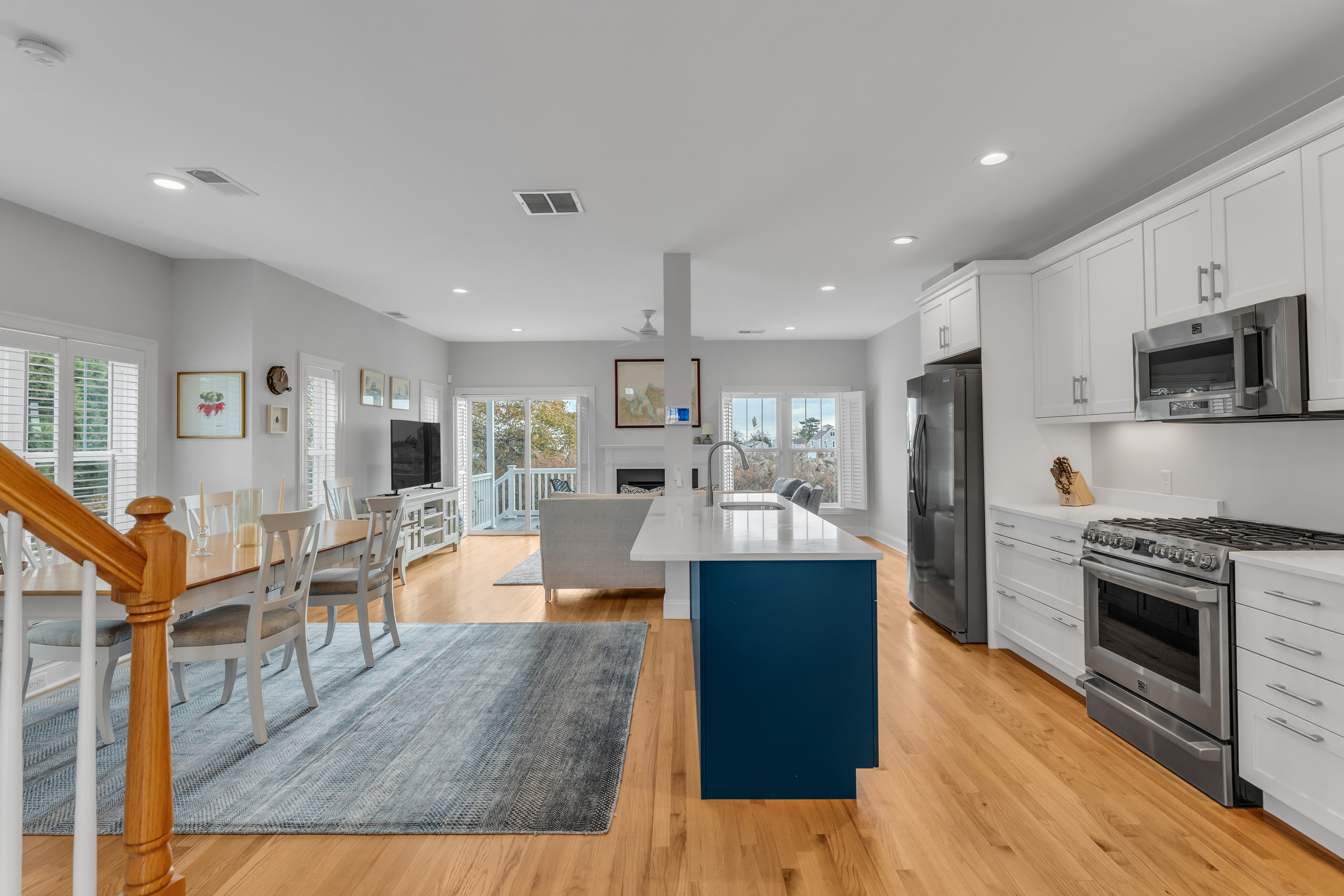610 Marina Way Landing, Unit 610 Westbrook, CT 06498 - Photo 20 of 40 a living room with stainless steel appliances granite countertop furniture wooden floor and a kitchen view