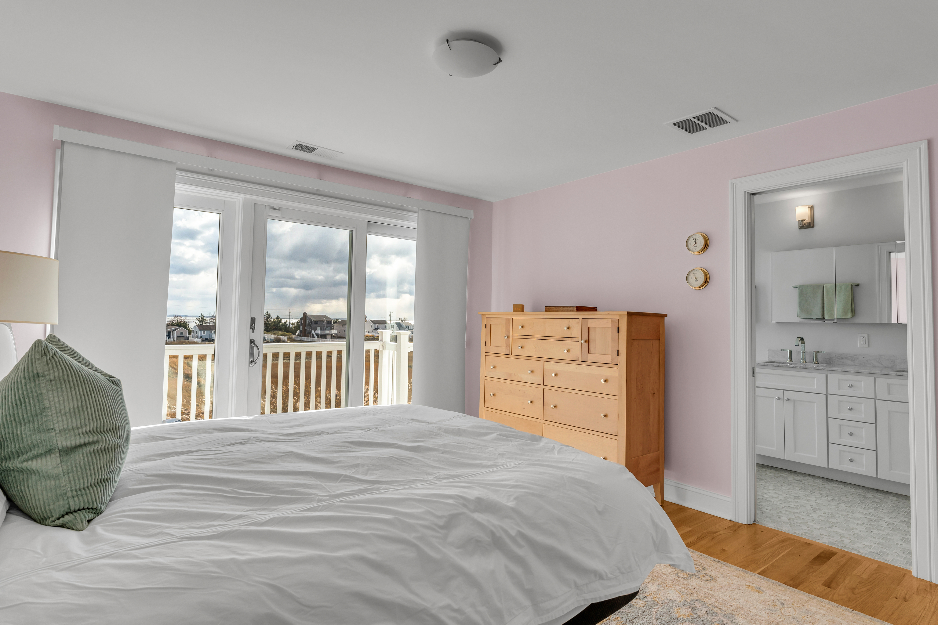 610 Marina Way Landing, Unit 610 Westbrook, CT 06498 - Photo 22 of 40 a bedroom with a large bed and a dresser