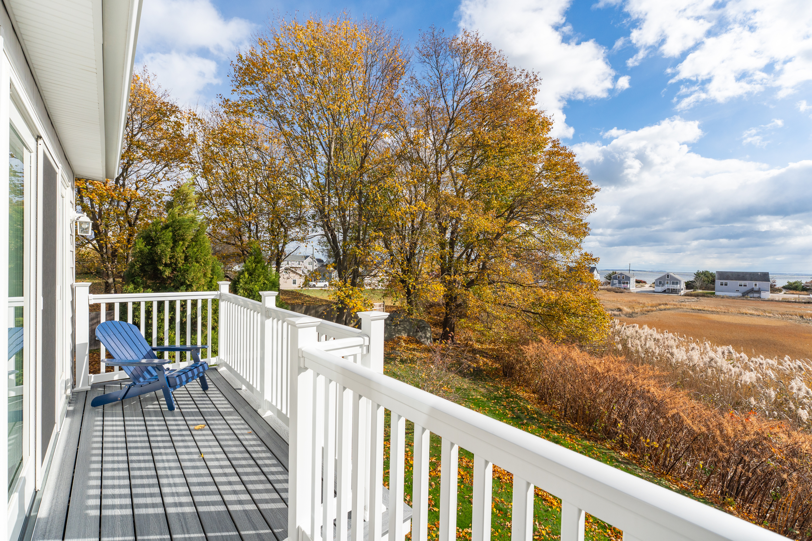 610 Marina Way Landing, Unit 610 Westbrook, CT 06498 - Photo 26 of 40 a view of a balcony with wooden floor and fence