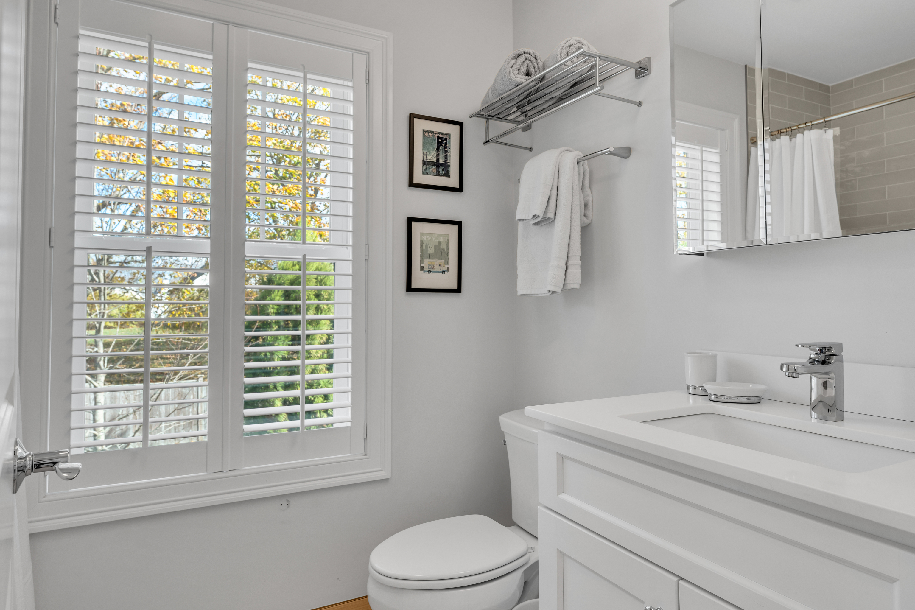 610 Marina Way Landing, Unit 610 Westbrook, CT 06498 - Photo 33 of 40 a bathroom with a sink a toilet and a window