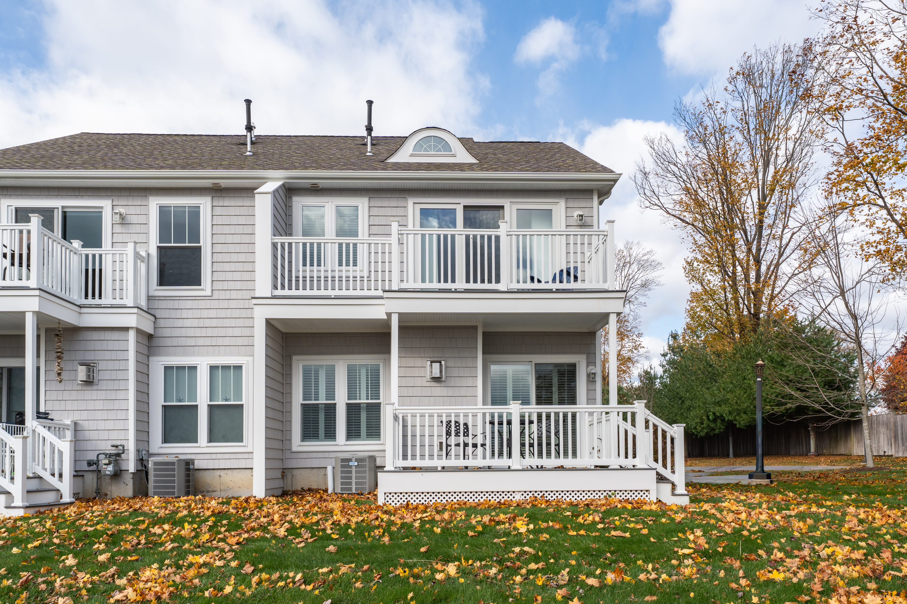 610 Marina Way Landing, Unit 610 Westbrook, CT 06498 - Photo 36 of 40 a front view of a house with a garden