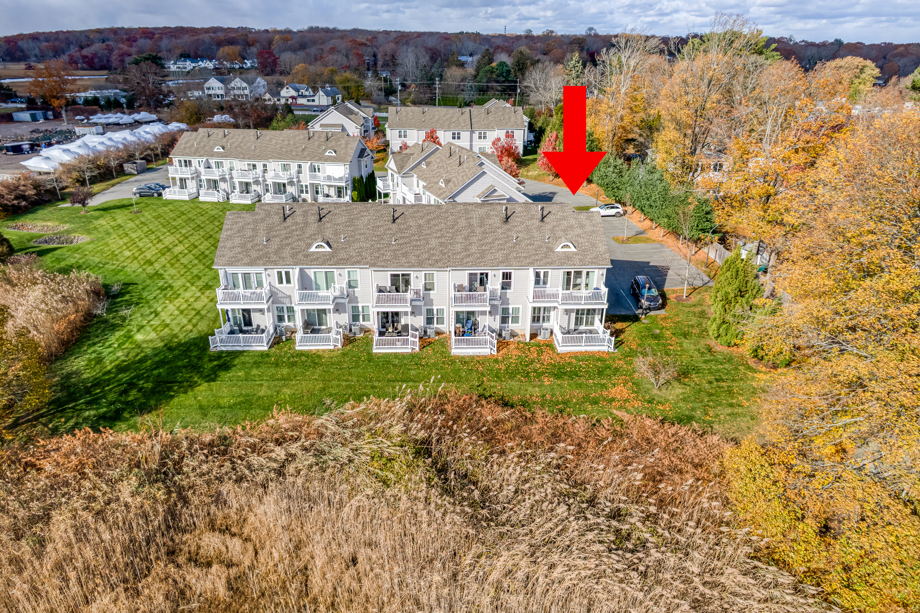 610 Marina Way Landing, Unit 610 Westbrook, CT 06498 - Photo 4 of 40 an aerial view of residential house with pool and yard