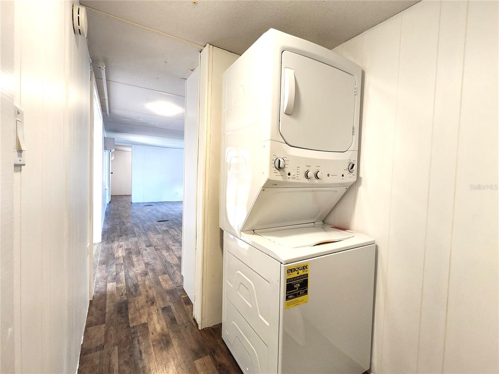 10129 East Bass Circle Inverness, FL 34450 - Photo 16 of 34 a utility room with dryer and washer