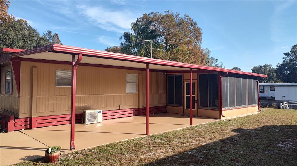 10129 East Bass Circle Inverness, FL 34450 - Photo 2 of 34 a view of a backyard