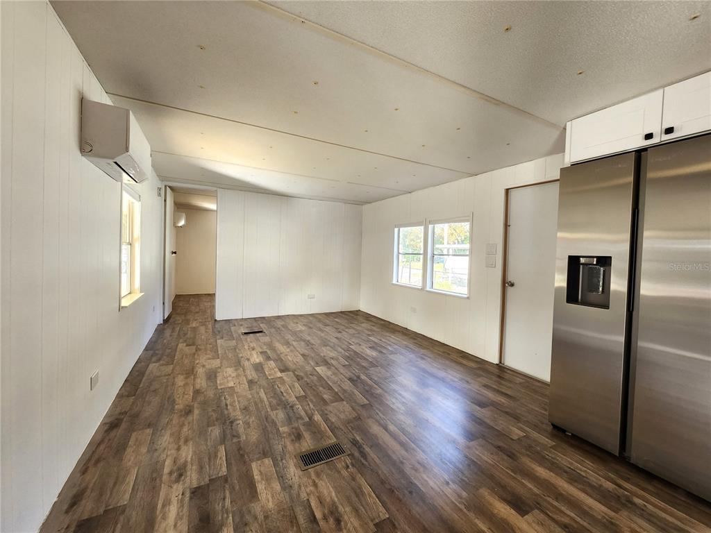 10129 East Bass Circle Inverness, FL 34450 - Photo 24 of 34 a view of empty room with wooden floor