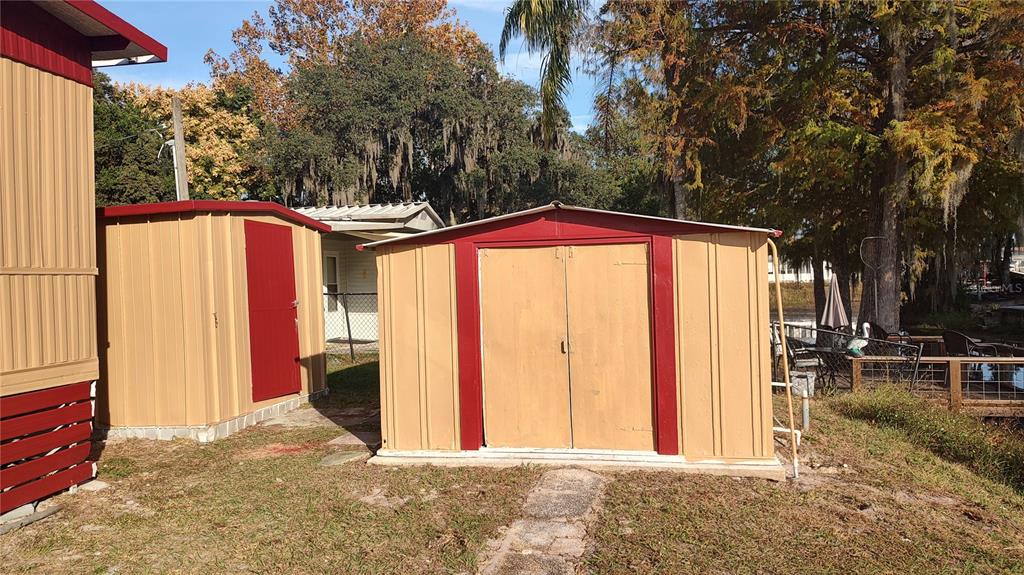 10129 East Bass Circle Inverness, FL 34450 - Photo 28 of 34 a view of swimming pool with backyard