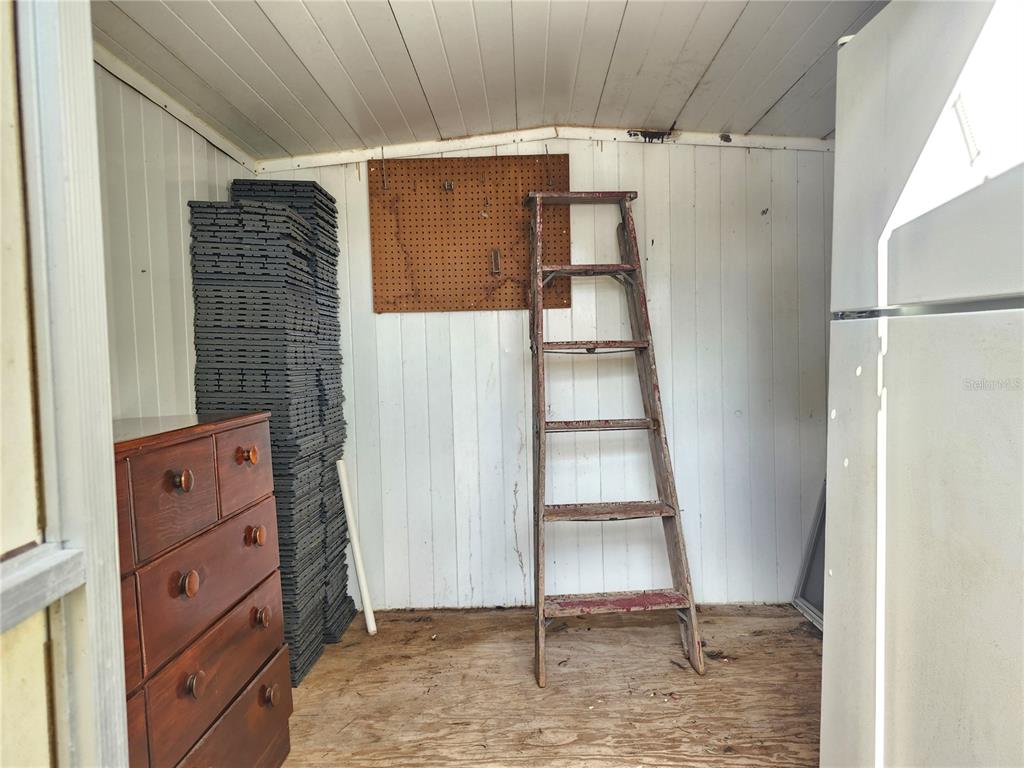10129 East Bass Circle Inverness, FL 34450 - Photo 29 of 34 a view of walk in closet