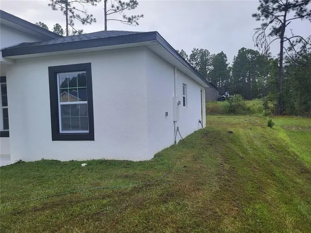 a house with garden in front of it