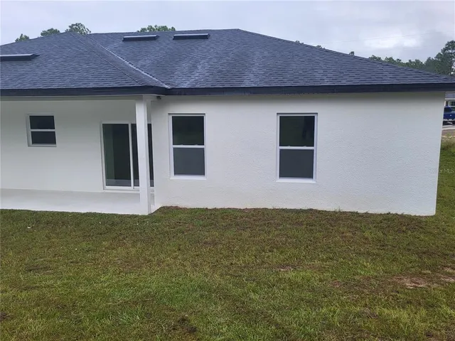 a front view of house with yard