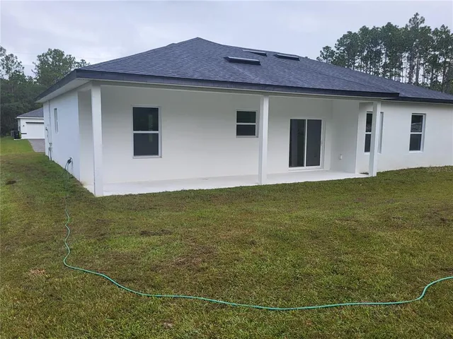 a front view of house with yard
