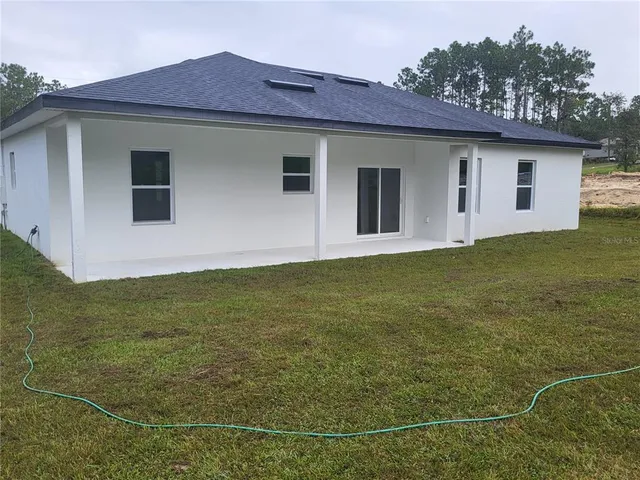 a front view of house with yard