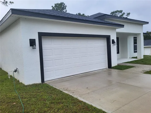 a view of backyard with a potted plant