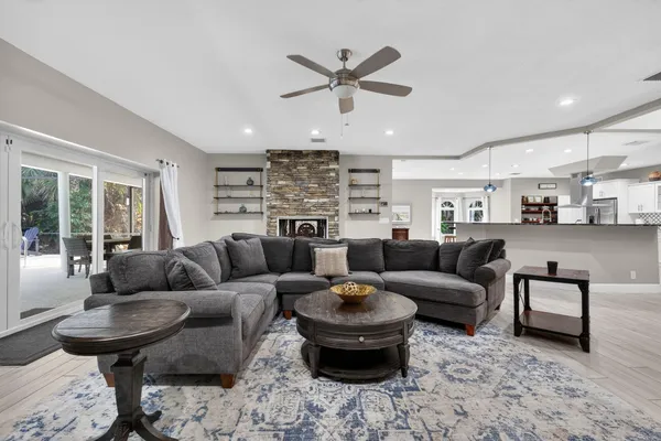 a kitchen with stainless steel appliances a sink and cabinets