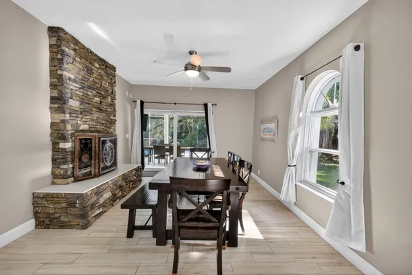 a bathroom with a toilet a sink and shower