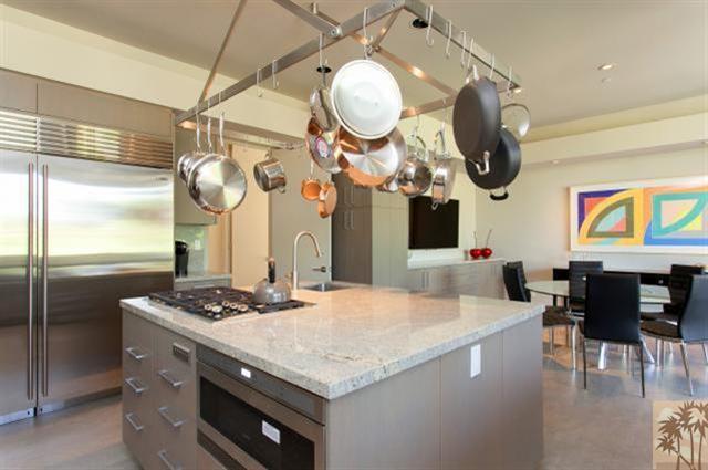 71172 La Paz Road Rancho Mirage, CA 92270 - Photo 14 of 51 a kitchen with a table and chairs in it