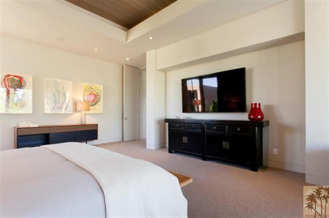 71172 La Paz Road Rancho Mirage, CA 92270 - Photo 20 of 51 a bedroom with a bed and a flat screen tv