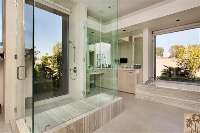 71172 La Paz Road Rancho Mirage, CA 92270 - Photo 21 of 51 a bathroom with a tub sink and mirror