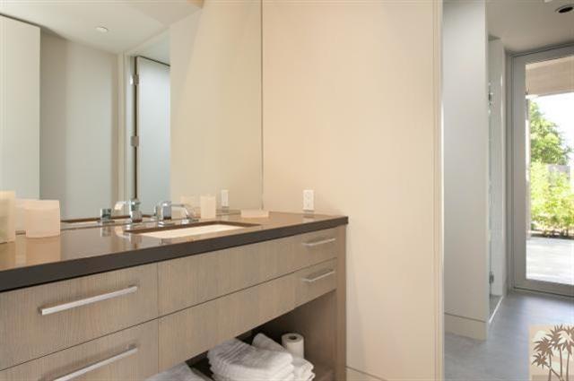 71172 La Paz Road Rancho Mirage, CA 92270 - Photo 24 of 51 a bathroom with a sink and a mirror