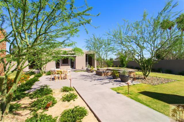 71172 La Paz Road Rancho Mirage, CA 92270 - Photo 30 of 51 a view of swimming pool with outdoor seating and trees in the background